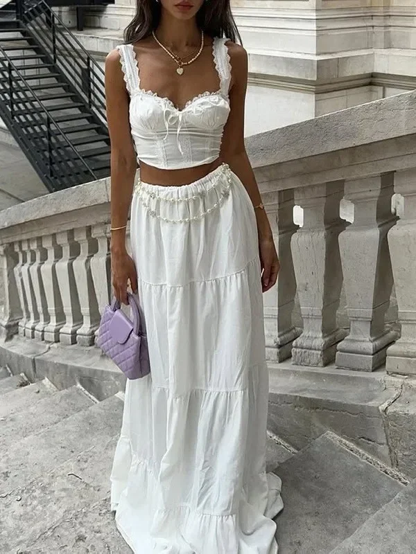 Effortless Elegance: Classic White Sleeveless Vest & Maxi Skirt Set