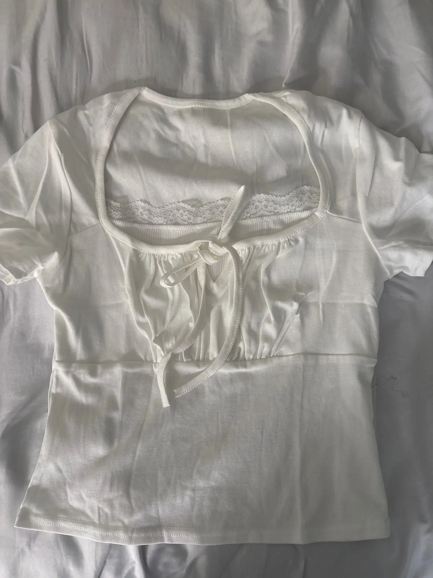 Trendy White Knitted Tee with Patch - Summer Style Essential photo review