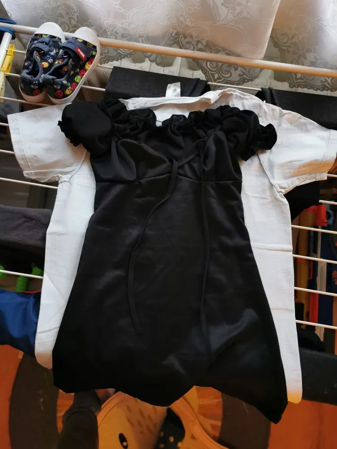 Elegant Black Backless Mini Dress with Lace-Up Detail photo review