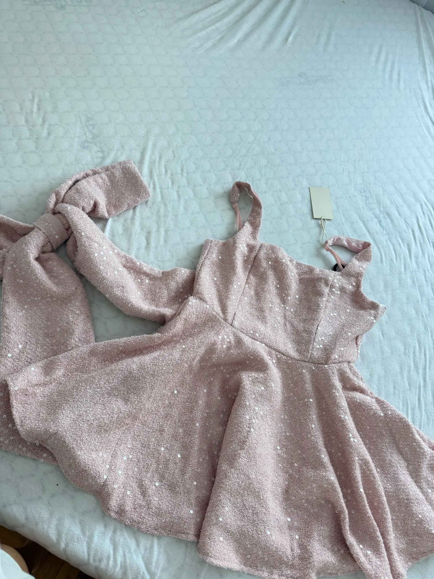 Glamorous Backless Mini Dress with Sequins & Bow Design photo review