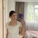 Trendy White Knitted Tee with Patch - Summer Style Essential photo review