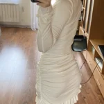 Elegant Ruched Mini Dress with Twist & Ruffle Hem for Parties photo review