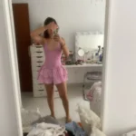 Flirty Pink Halter Mini Dress with Ruffled Hem - Summer Ready photo review