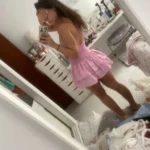 Flirty Pink Halter Mini Dress with Ruffled Hem - Summer Ready photo review