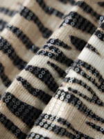 Zebra Print Sequin Shorts for a Chic Summer Party Look - Image 6