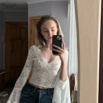 Lace-Trimmed V-Neck Crop Top with Flare Sleeves for Events photo review
