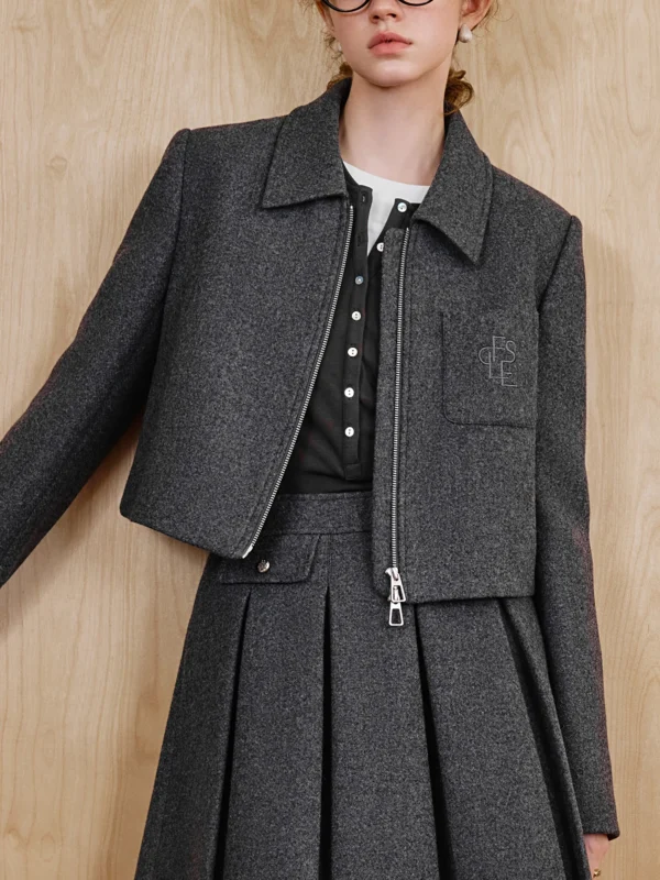 Wool Jacket And Pleated Skirt Set In Grey And Khaki 2 Grey Wool Short Jacket With A Polo Neck And Zipper, Styled With A Matching Skirt Set.